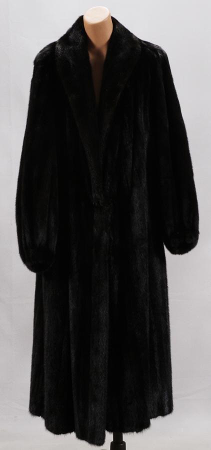 BLACK DIAMOND LONG MINK COAT: BLACK DIAMOND LONG MINK COAT Full sweeping back, full length sleeves. Size 12. Could fit larger size due to sweep. Coat length 48", sleeve length 24", Shoulder width 18-19", Sweep 76".