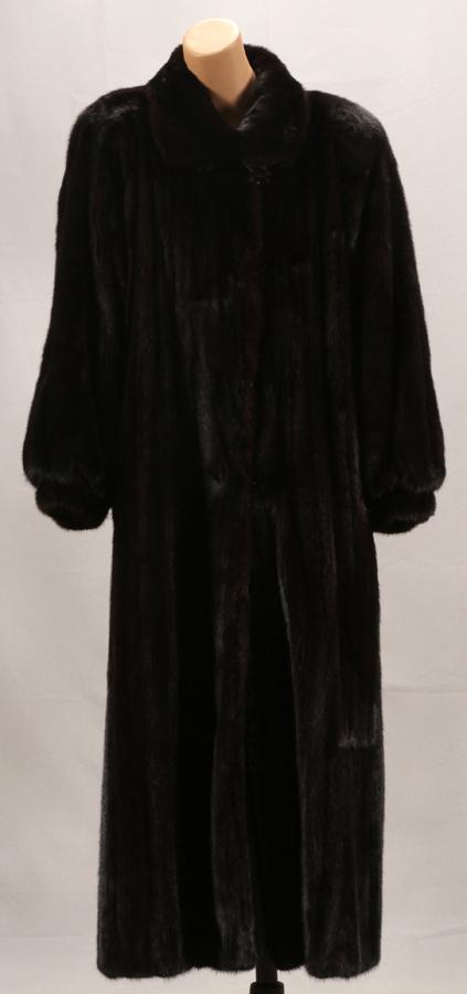 PERRY ELLIS, FULL LENGTH, MINK COAT: PERRY ELLIS, FULL LENGTH, MINK COAT A beautiful, Perry Ellis, full length mink coat with set in sleeves, princess cuffs, a tailored collar, and satin french lining. The coat has inseam pockets and sli