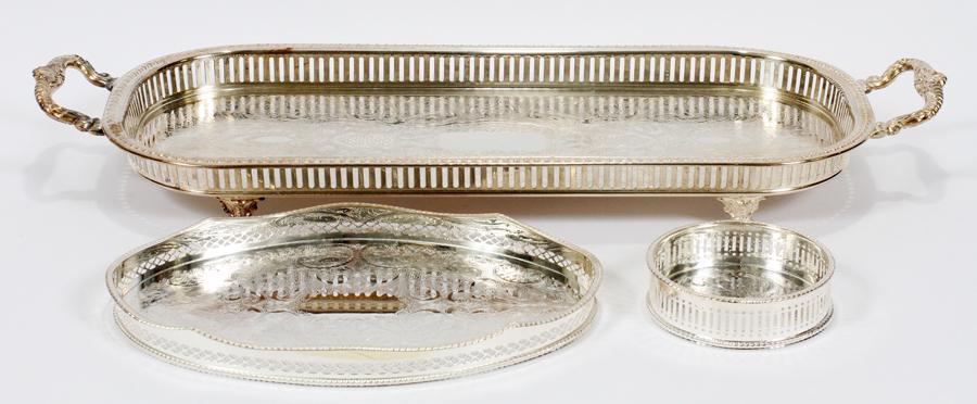REED AND BARTON & SHEFFIELD PLATE TRAYS & COASTER: REED AND BARTON & SHEFFIELD PLATE SILVER PLATE TRAYS & WINE COASTER 3 H 2.5" W 9" L 25" A Reed and Barton Sheffield plate tray, having a pierced gallery and measuring 12" long by 8" wide. A silver pla