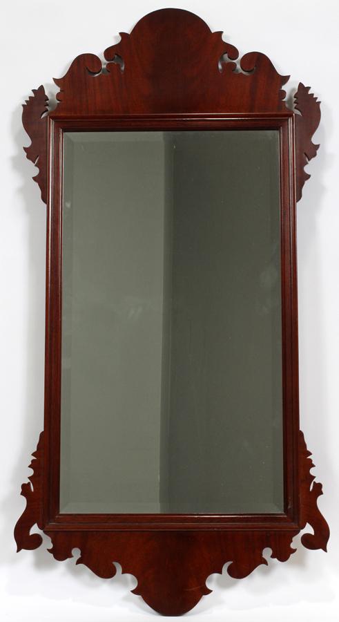 KITTINGER, MAHOGANY BEVELLED MIRROR H 47" W 23": KITTINGER, MAHOGANY BEVELLED MIRROR H 47" W 23" Vertical. Chippendale style, Williamsburg collection. Model # RH 2090 Removed from Tarragona Way, Troy, Mich.