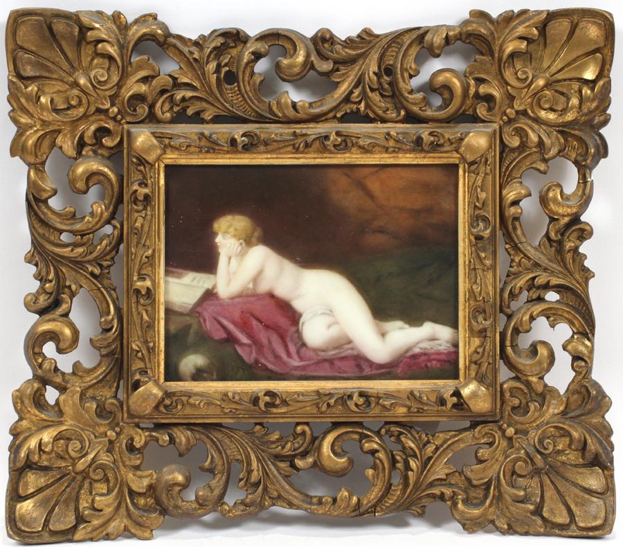 GERMAN PAINTING ON PORCELAIN PLAQUE, 20TH C.: GERMAN PAINTING ON PORCELAIN PLAQUE, 20TH C., H 6", W 8" Decorated with a reclining female nude; unsigned; pierced gilt frame.