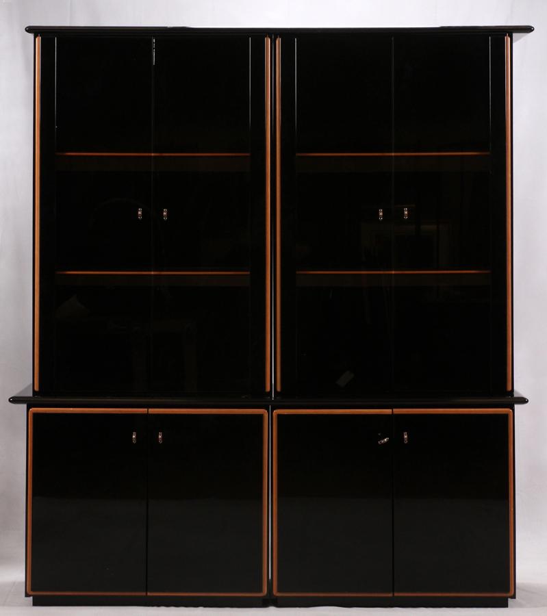 ROCHE BOBOIS LACQUERED WOOD DISPLAY CABINET: ROCHE BOBOIS LACQUERED WOOD DISPLAY CABINET, H 84", W 75.5", D 21"A Roche Bobois display cabinet. This piece offers electric lighting fixtures and an elegant black lacquer finish. Having four pairs of