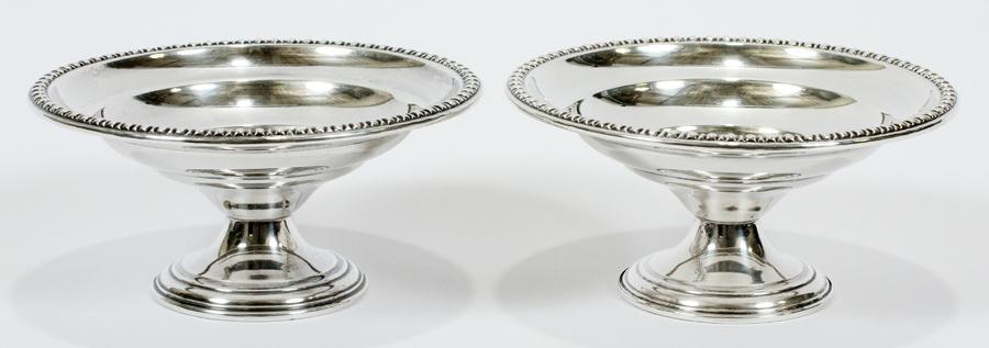 WILLIAM ROGERS STERLING SILVER COMPOTES, PAIR: WILLIAM ROGERS STERLING SILVER COMPOTES, PAIR, H 2.75", DIA 6"A pair of William Rogers Manufacturing Co. weighted sterling silver compotes. Each offers a deep basin and bead and reel pattern along the
