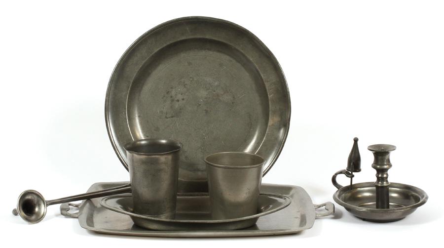 PEWTER SERVEWARE & CANDLESTICK, 7 PCS, H .5"-5": PEWTER SERVEWARE & CANDLESTICK, 7 PCS, H .5"-5"A selection of antique pewter serveware and decor. Comprises of two cups (one initialed "F.A. 1878", the other "Metawa Tin"), one candlestick holder, one