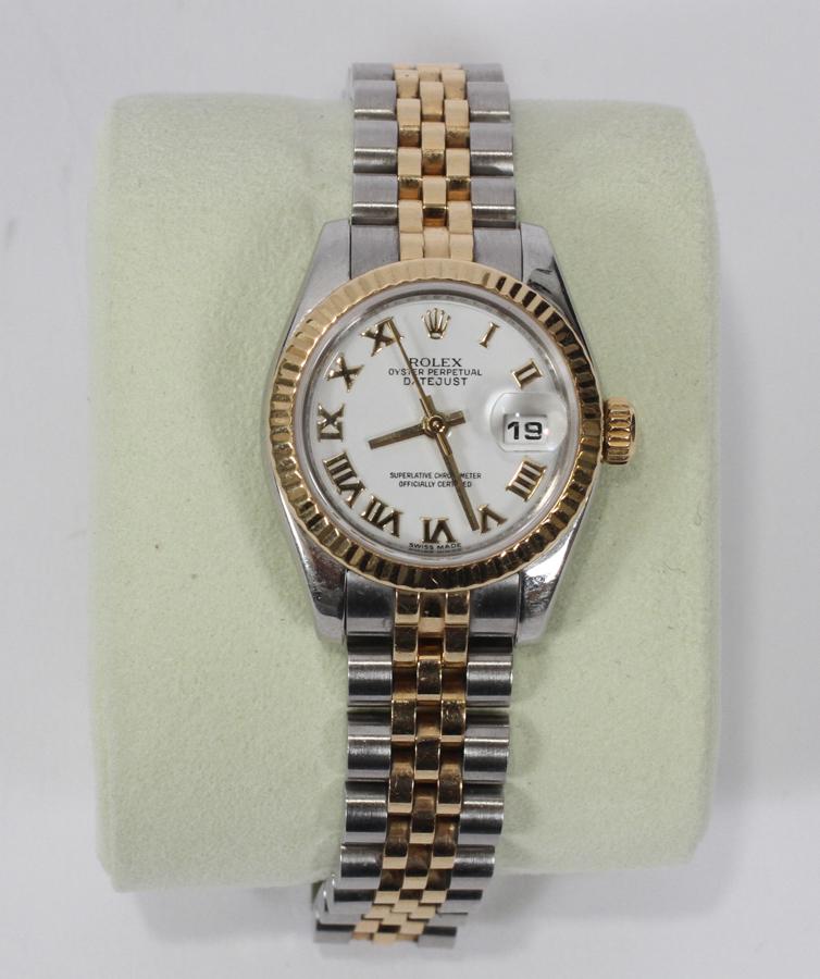 ROLEX OYSTER DATEJUST STAINLESS STEEL & 18KT GOLD WRIST: ROLEX OYSTER DATEJUST STAINLESS STEEL & 18KT GOLD WRISTWATCH, L 6" A Rolex Oyster Perpetual Datejust wristwatch. Having a stainless steel and 18kt gold engineer style band, deployment clasp and signat