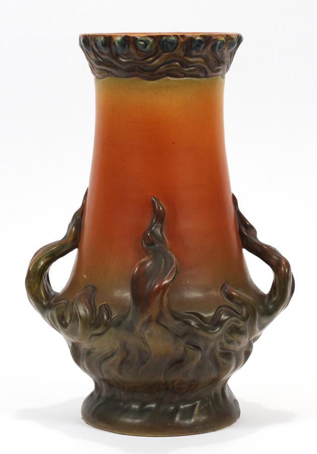 PETER IPSEN ART NOUVEAU POTTERY VASE: PETER IPSEN (DANISH, 19TH C.) ART NOUVEAU POTTERY VASE H 14" DIA 10" A Peter Ipsen art pottery vase. Having sinuous handles and applied dimensional decorations. Having hues of brown, orange,and gold. 