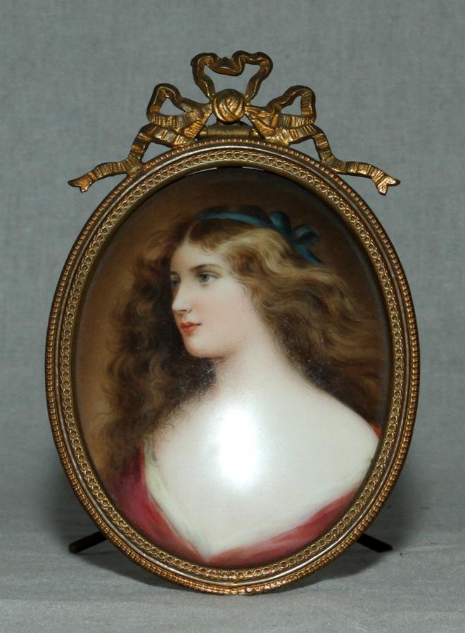 GERMAN, PAINTED, PORCELAIN PORTRAIT MINIATURE: GERMAN, PAINTED, PORCELAIN PORTRAIT MINIATURE, H 3.5", W 2.75" Impressed 'JR' and '15'. In gilt metal frame.