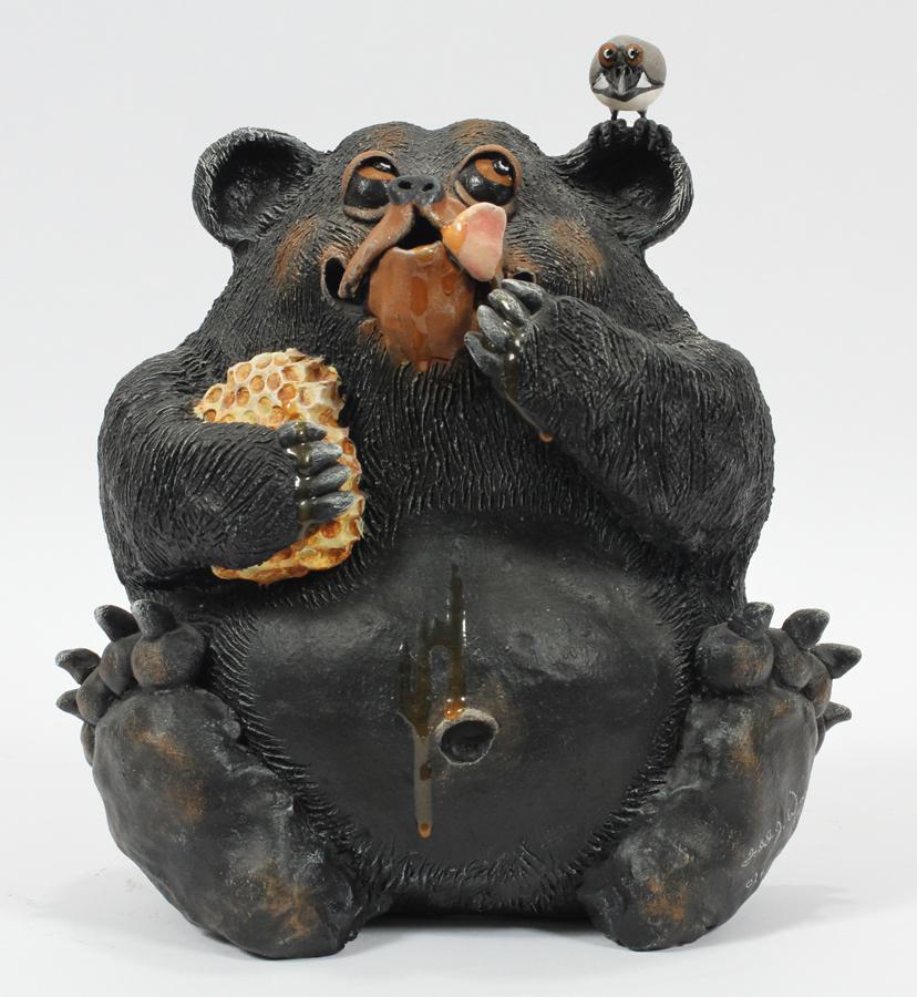 TODD J. WARNER CERAMIC BEAR WITH BIRD & HONEY: TODD J. WARNER (AMERICAN, B. 1945), CERAMIC BEAR WITH BIRD & HONEY, 26/159, 1995, H 11.5", W 10.5" Signed, dated and numbered on the side.