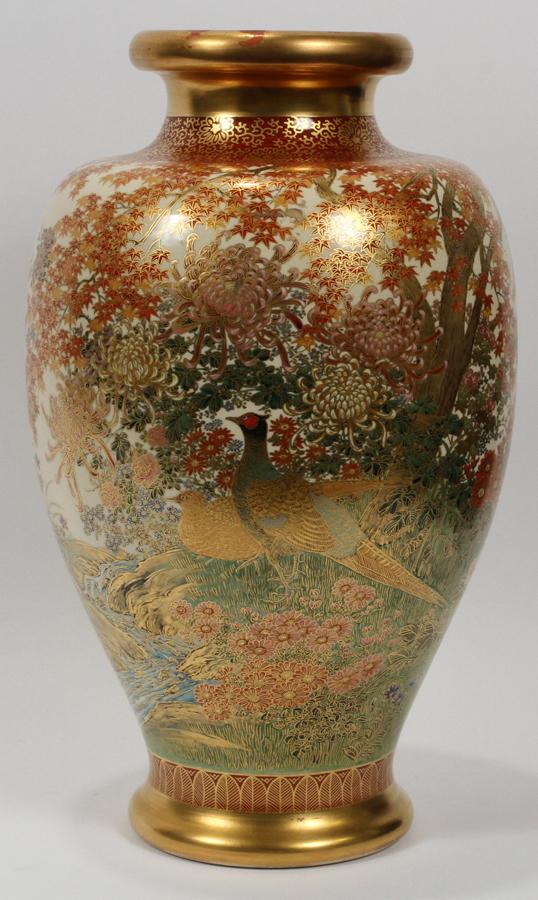SATSUMA EARTHENWARE POTTERY VASE, H 16", DIA 10": SATSUMA EARTHENWARE POTTERY VASE, H 16", DIA 10" Having a flared rim with a narrow neck opening to a large body adorned with gilt accents throughout with pheasants and floral designs and tapering to a