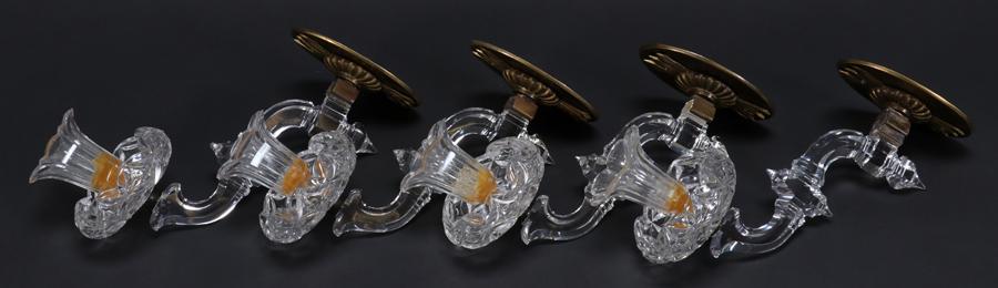 ENGLISH, CUT-GLASS & BRASS, SINGLE-LIGHT SCONCES: ENGLISH, CUT-GLASS & BRASS, SINGLE-LIGHT SCONCES, 19TH C., SET OF 4, H 10" Each having an up scrolled arm with floriform nozzle and etched scallop drip-pan. Not electrified.