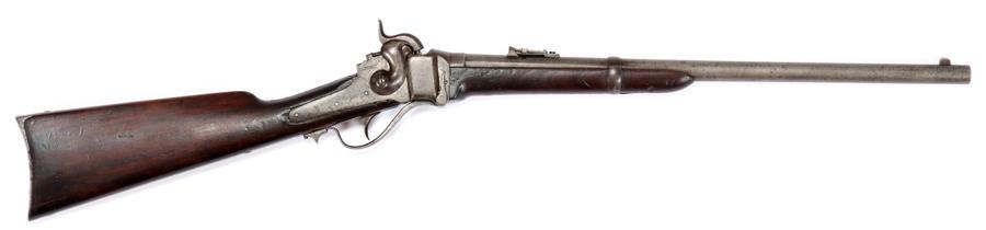 SHARPS NEW MODEL 1863 CARBINE 52 CALIBER RIFLE: SHARPS NEW MODEL 1863 CARBINE 52 CALIBER RIFLE Sling ring bar affixed to the left side without patchbox. Stamped, "Sharps Rifle, Manufg. Co., Hartford, Conn., New model 1863" along the smooth barrel, 