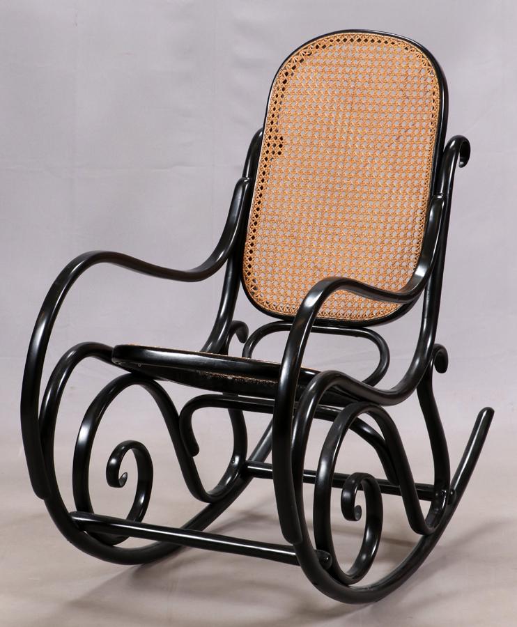 BENT WOOD ROCKING CHAIR, H 41", W 20", D 39": BENT WOOD ROCKING CHAIR, H 41", W 20", D 39" Black bentwood frame with a cane backrest and seat.