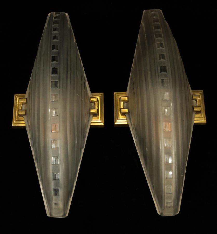 SABINO FRANCE, ART DECO FROSTED GLASS, WALL SCONCE: SABINO FRANCE, ART DECO FROSTED GLASS, WALL SCONCE, #4830, C1920, PAIR, H 16", W 6", D 5" A pair of Sabino French Art Deco frosted heavy glass, wall sconces, signed and numbered 4830. With brass mount