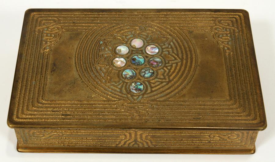 TIFFANY STUDIOS BRONZE & ABALONE BOX: TIFFANY STUDIOS BRONZE & ABALONE BOX, W 5.5", D 3.5", #1176 An early 20th century desk box by Tiffany Studios New York. Having gilt bronze accented with abalone inlay and gilt patina. Having "Tiffany