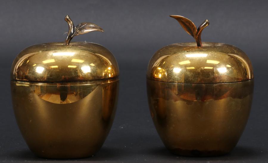 TIFFANY & CO. GILT STERLING APPLE BOXES: TIFFANY & CO. GILT STERLING APPLE BOXES, PAIR, H 4.5"A pair of Tiffany & Co. gilt silver boxes. Each having an apple form. Signature branding and "23748" impressed to the undersides. Property of Rober