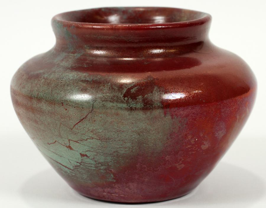 IRA & ELLA PETERS, PEWABIC POTTERY VASE: IRA & ELLA PETERS, PEWABIC POTTERY VASE, H 3", DIA 4"A Pewabic Pottery vase by Ira and Ella Peters. Having a white clay body and iridescent glaze boasting oxblood, turquoise and copper tones with obse