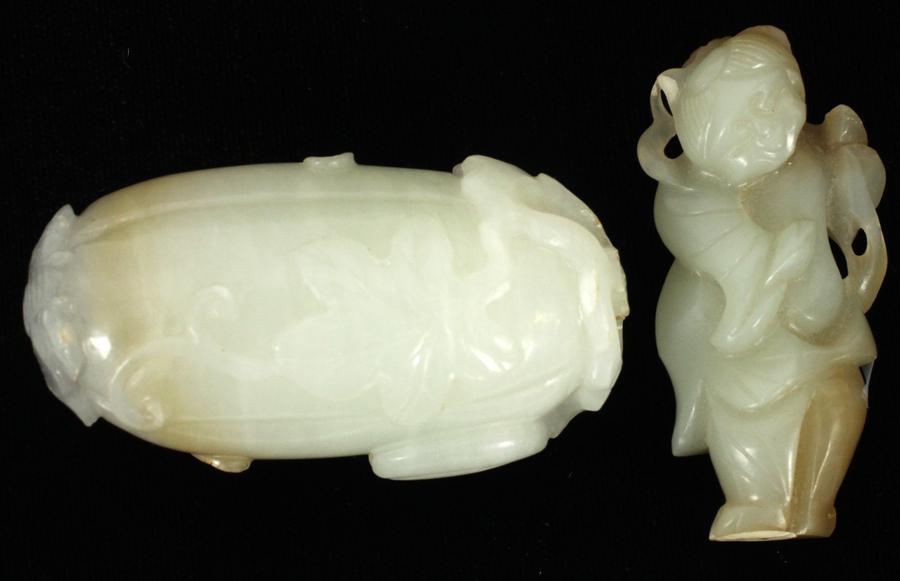 CARVED JADE POMEGRANATE & FIGURE, H 2" & 2.25": CARVED JADE POMEGRANATE & FIGURE, H 2" & 2.25" The carved jade pomegranate has carved leaves at the body and a butterfly the top, the height is 2.25" and the width is 1.25". The jade figure has a heig