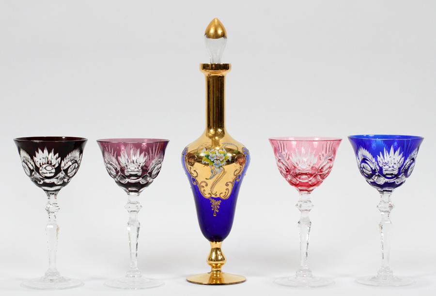 VENETIAN GLASS DECANTER & CRYSTAL WINES: VENETIAN GLASS DECANTER & MULTI-COLORED CRYSTAL WINES, 5 PIECESVenetian glass decanter, H 14", cobalt blue and fired gold. Four cut crystal wine glasses in colors of pink, blue raspberry and dark red.