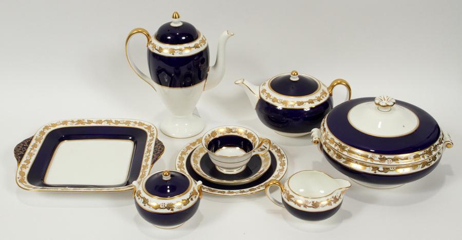 WEDGWOOD "WHITEHALL" COFFEE TEA SET 9 PCS.: WEDGWOOD "WHITEHALL" COFFEE TEA SET 9 PCS. Wide cobalt blue band. Gilt band of grape leaves. Coffee pot with cover, tea pot with cover, creamer, sugar bowl with cover, casserole with cover Dia 9", cak