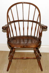 NEW ENGLAND WINDSOR COMB-BACK ARMCHAIR WITH KNU: With knuckles, seven-spindle back over 13 spindles. Nicely shaped plank seat. H 35" W 24" Purchased from Mariwynne Shop 7481 Brecksville Rd, Independence Ohio in 1973 for $750. Ex collection of