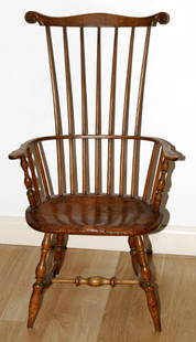 NEW ENGLAND WHITE OAK WINDSOR COMB-BACK ARMCHAI: Rare. Seven spindles over 13 spindles, plank seat. Flat arms. Oval seat. Beautiful pronounced leg turnings Purchased from Lillian Blankley Cogan Antiquary, 22 High Street, Farmington, Conn 06032 