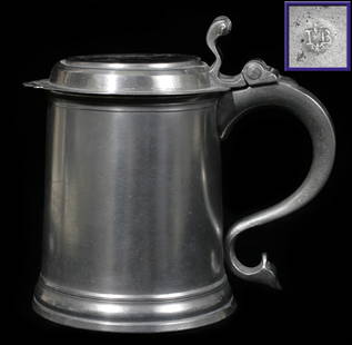 AMERICAN PEWTER QUART TANKARD, JOHN BASSETT, 18: Touchmark I.B. at the inside, fleur de lis over IB, having a hinged cover and scroll [fish tail] handle. Lent to Yale University Art Gallery - Victoria and Albert Museum for Bicentennial Exhibition