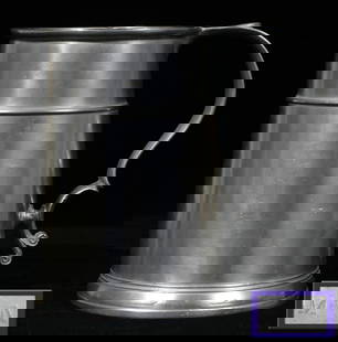 AMERICAN PEWTER TANKARD, ATTRIBUTED TO JOHN SKI: Attributed to John Skinner, having a scroll handle, Touchmark of flower inside base. Initials "MN on thumb r