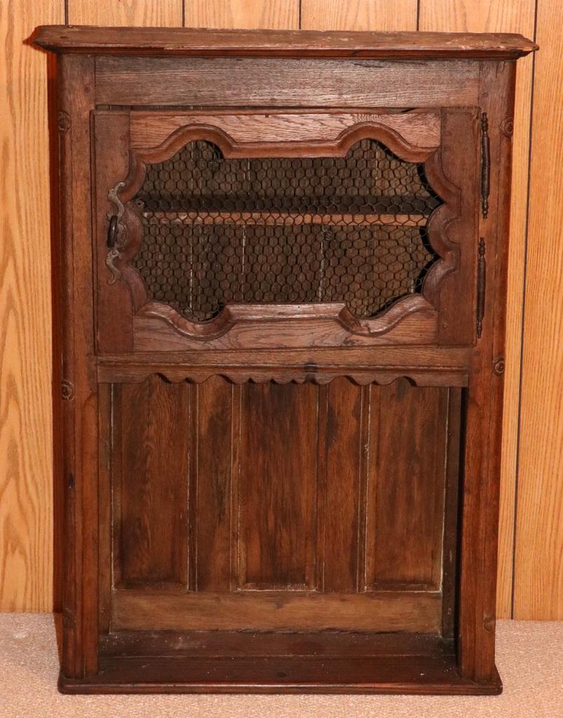 FRENCH COUNTRY OAK WALL SHELF, 18TH C: FRENCH COUNTRY OAK WALL SHELF, 18TH C, H 43", W 32", D 10"An 18th-century French country wall shelf. Having an upper hinged door with a metal grate above a large open storage area about the bottom hal