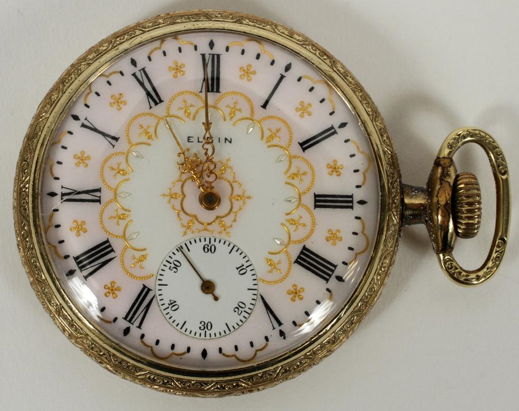 ELGIN POCKET WATCH, DIA 2", T.W. 80 GR: ELGIN POCKET WATCH, DIA 2", T.W. 80 GR An Elgin pocket watch. Engraved bezel and backplate with monogram. Having Roman numerals, stem wind, seconds dial at 6'oclock, marked 'Elgin' on the face with gi