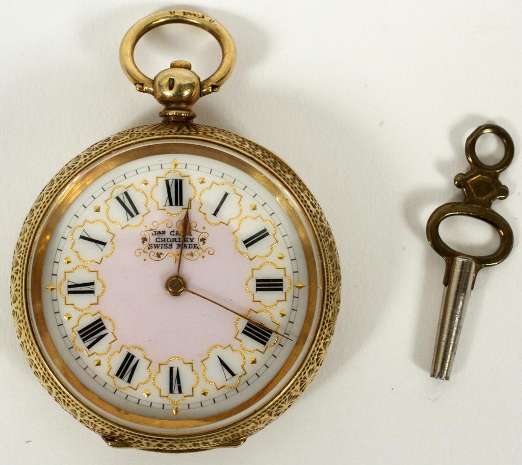 CHORLEY (SWISS) OPEN FACE, POCKET WATCH & KEY: CHORLEY (SWISS) OPEN FACE, POCKET WATCH & KEY, DIA 1.5", T.W. 53 GR A Chorley Swiss made pocket watch with a key wind. Having an elaborately engraved case of flowers and acanthus leaves. Open face wit