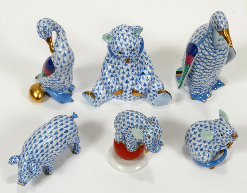 HEREND PORCELAIN FIGURINES, 6 PCS, H 2"-5": HEREND PORCELAIN FIGURINES, 6 PCS, H 2"-5"Grouping of six Herend of Hungary hand-painted porcelain figurines, Includes the penguin, bear, pig, goose, elephant, and mouse. Features a cobalt blue fish s