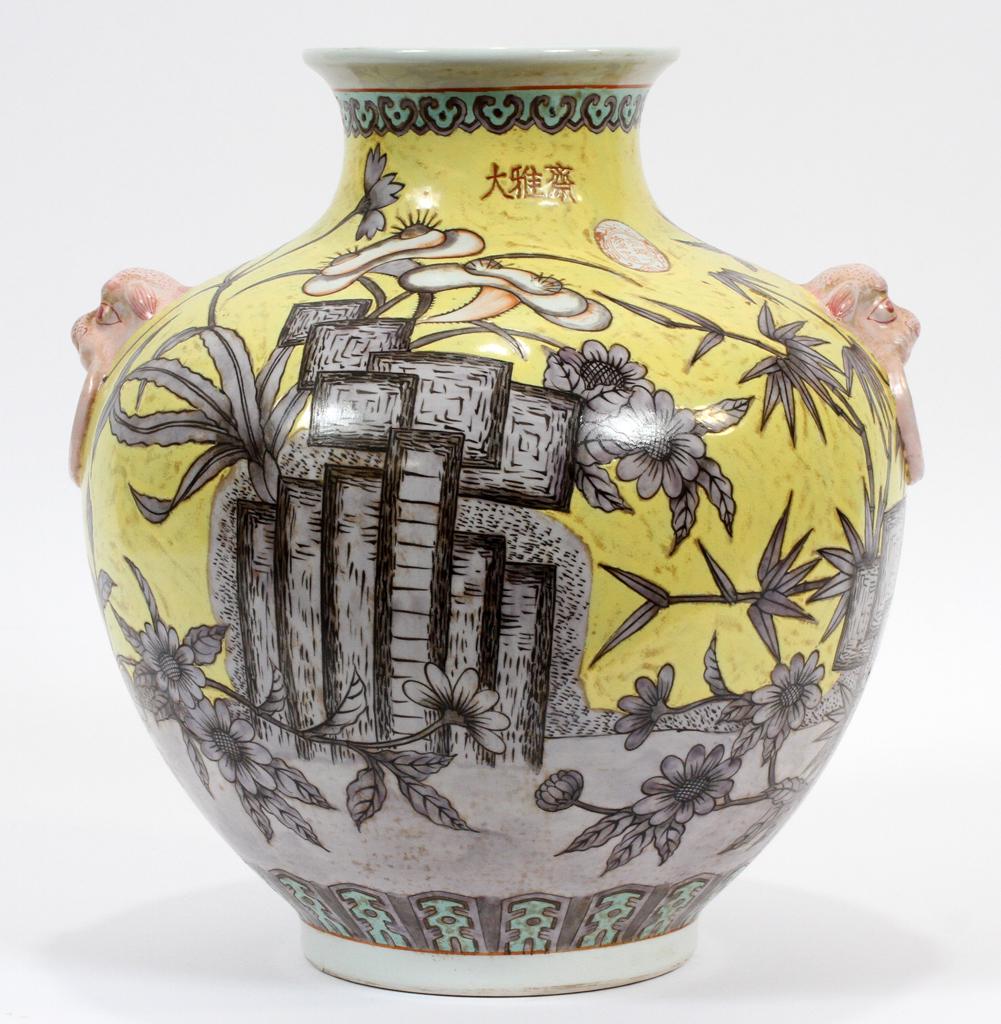CHINESE WHITE PASTE PORCELAIN VESSEL, H 13": CHINESE WHITE PASTE PORCELAIN VESSEL, H 13", DIA 11"A Chinese style white paste porcelain vessel. This piece features hand-painted muted botanical subjects against a lemon yellow ground. Having a flar