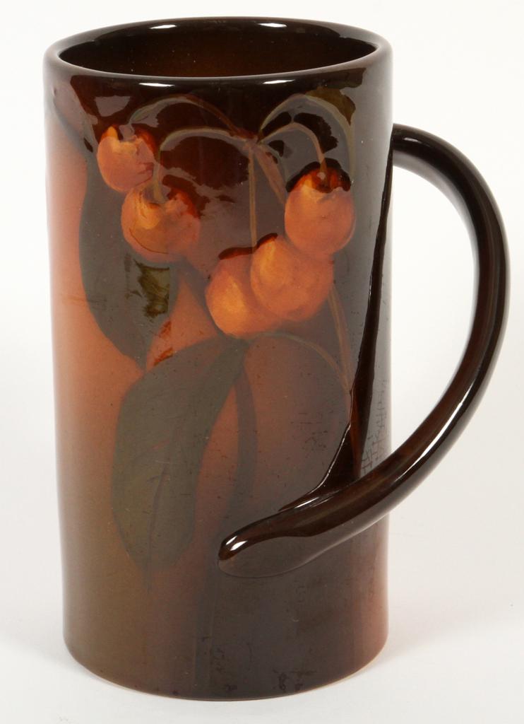 CAROLINE STEINLE ROOKWOOD POTTERY MUG, C. 1900: CAROLINE STEINLE (AMER, 1871-44), ROOKWOOD POTTERY MUG, C. 1900, H 6"An early 20th century 'Standard Glaze Ware' Rookwood Pottery vase. Decorated by Caroline Steinle with hand-painted fruit and foliat