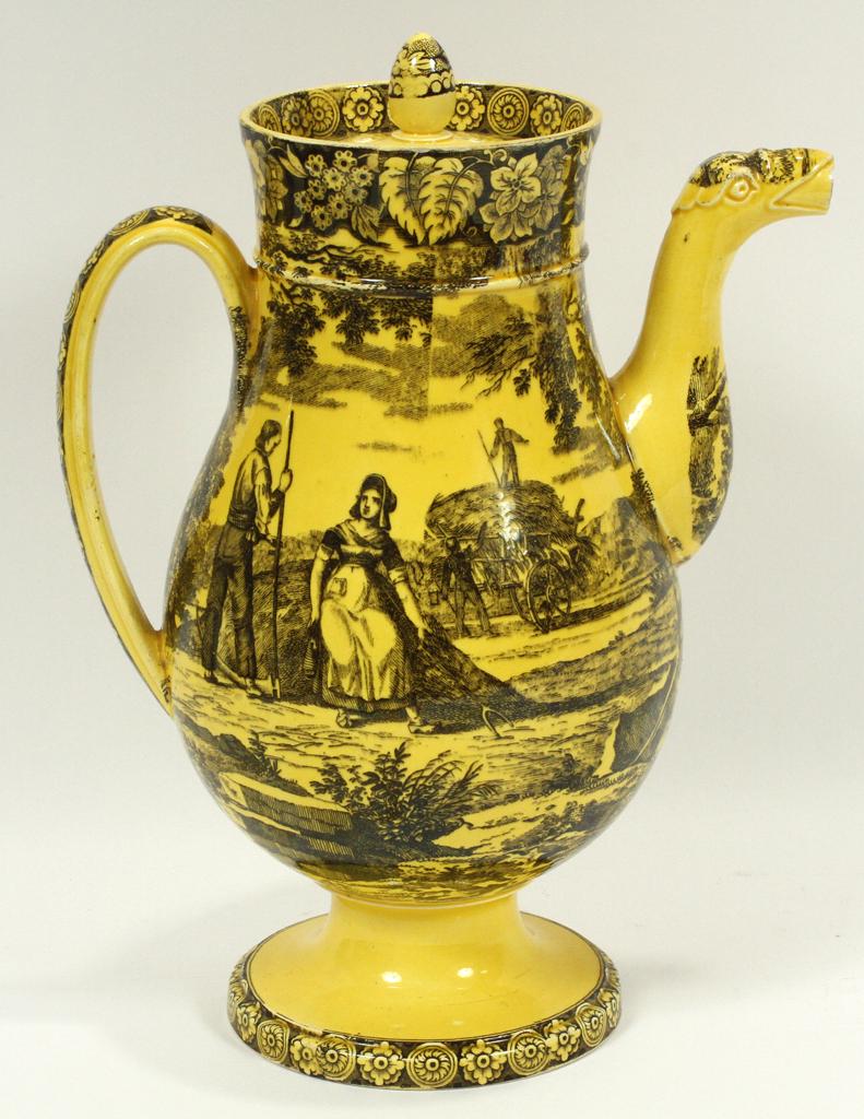 CREIL ET MONTEREAU YELLOW CREAMWARE COFFEE POT: CREIL ET MONTEREAU YELLOW CREAMWARE COFFEE POT C. 1830, H 8.5"Pedestal base. Black transfer on canary yellow ground. Creil et Montereau FaÃ¯enceries operated in the French communes of Creil, Oise, a
