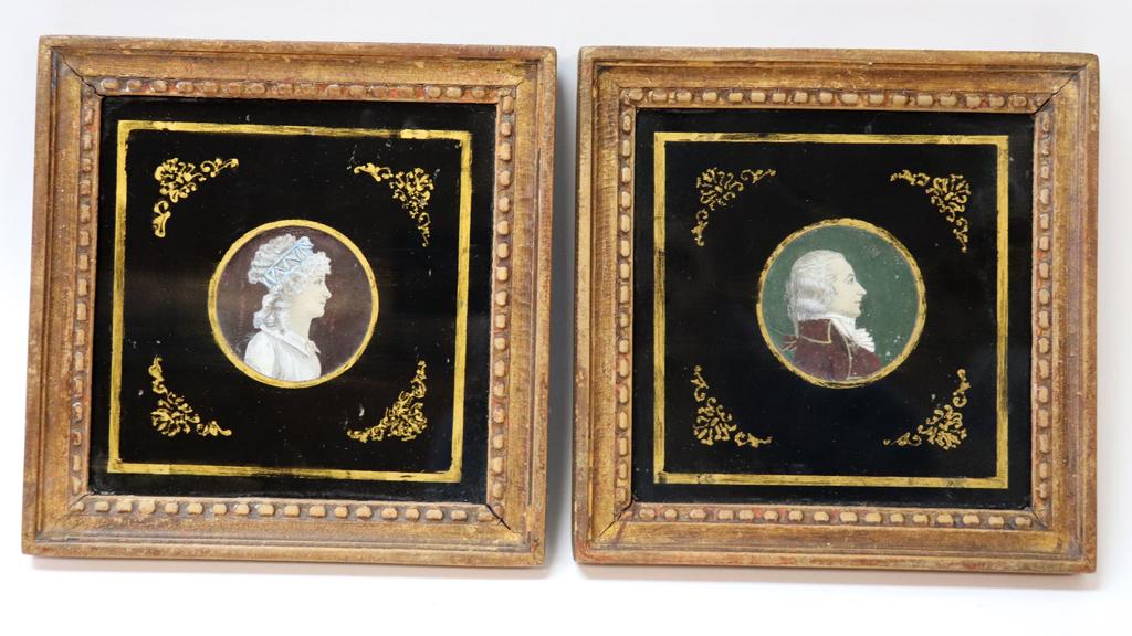 REVERSE PAINTINGS UNDER GLASS, 2 PCS: REVERSE PAINTINGS UNDER GLASS, 2 PCS, DIA 2", GEORGE & MARTHA WASHINGTON Frame 6.7" x 6.6".Eglomise black and gilt mat. Property of Robert Schweizer, Ann Arbor.