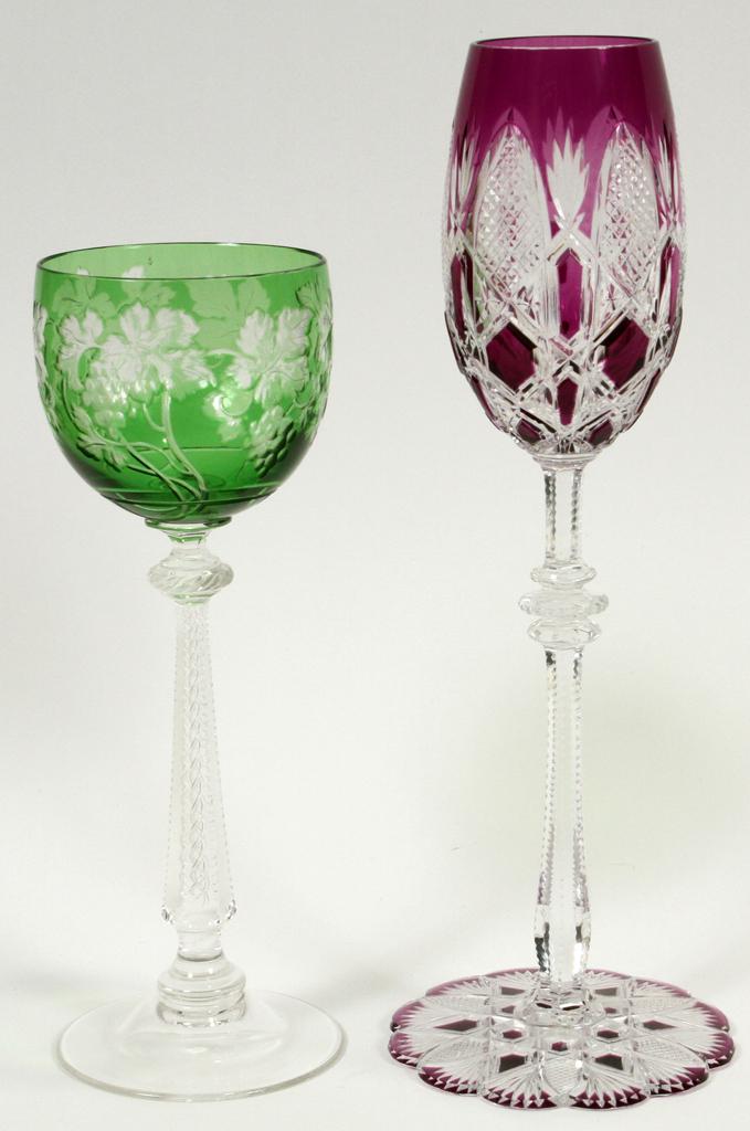 RARE BACCARAT OVERLAY STEM WINE GOBLET: RARE BACCARAT OVERLAY STEM WINE GOBLET, H 9.5", DIA 3.2", + ONE OTHER Exhibition piece. Finely hand cut. 19th. c. Petal cut foot. The violet goblet is signed. The green goblet is not signed. Property 