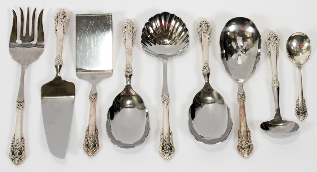 WALLACE GRAND BAROQUE SERVING FORKS AND SPOONS: WALLACE GRAND BAROQUE SERVING FORKS AND SPOONS, NINE OZT 1.57 WEIGHABLE 1 pie server 11", 1 cake server 10", 1 slotted spoon 9.7", 1 large meat fork 11", 1 sugar spoon 6 1/8", 1 gravy ladle 8.25", 2 s