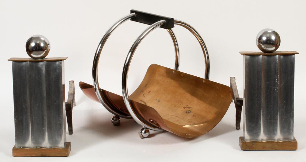 PAIR ART DECO ANDIRONS AND FIREWOOD BASKET: PAIR ART DECO CHROME, BRASS, WROUGHT IRON ANDIRONS AND FIREWOOD BASKET 3 H 16" W 20" A pair of Art Deco chrome-accented andirons with a firewood basket. Andirons measure 15" tall and 20" long; the bas