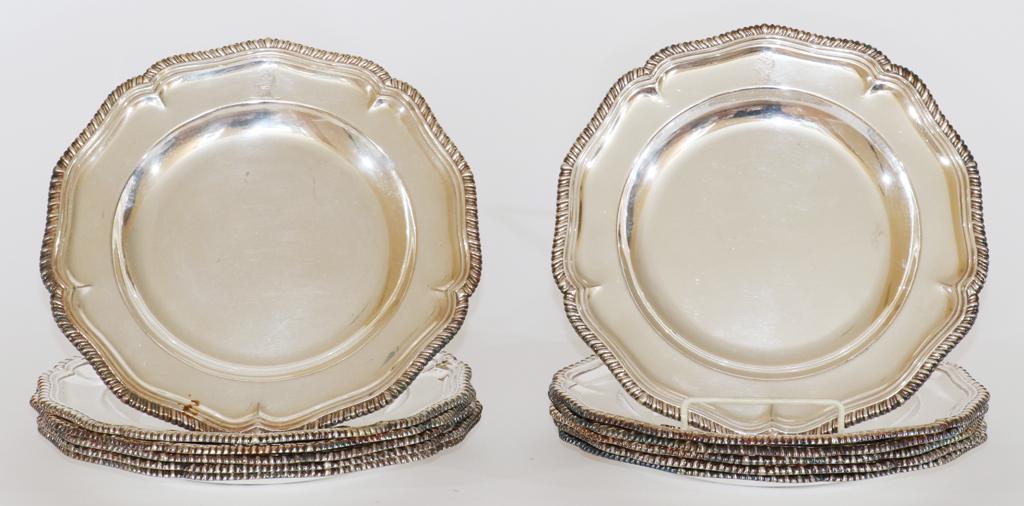 SHEFFIELD PLATE (ENGLISH) SERVICE PLATES, 12 PCS: SHEFFIELD PLATE (ENGLISH) SERVICE PLATES, 12 PCS, DIA 9.5" A collection of twelve Sheffield Plate service plates. Having a gadroon edge, crown mark. Property of Robert Schweizer, Ann Arbor.