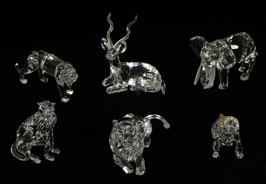 SWAROVSKI CRYSTAL ANIMAL FIGURINES, 6 PCS: SWAROVSKI CRYSTAL ANIMAL FIGURINES, 6 PCS, H 2.5"-4"A collection of Swarovski crystal African animal figurines. Comprised of three large cats, an elephant, monkey and kudu. 5 with boxes.