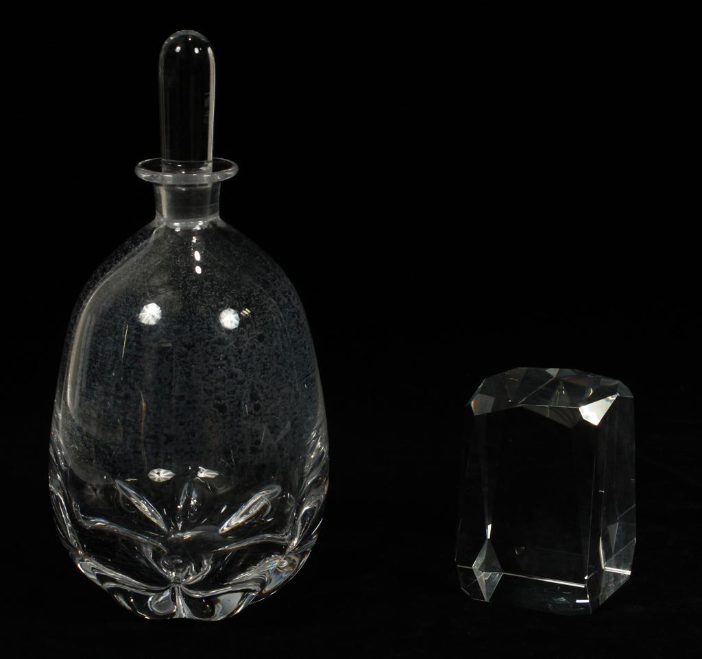 ORREFORS SWEDEN CRYSTAL DECANTER & PAPERWEIGHT 2: ORREFORS SWEDEN CRYSTAL DECANTER & PAPERWEIGHT 2 H 10" DIA 5" A crystal decanter from Orrefors, Sweden as well as an unsigned crystal paperweight.
