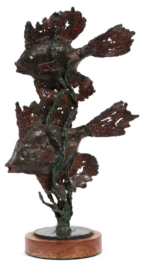 MIKE BUCHA, (AMER 20TH. C.) CAST METAL, SCULPTURE: MIKE BUCHA, (AMER 20TH. C.) CAST METAL, SCULPTURE, H 13.5"A contemporary cast metal sculpture of two fish swimming among the seagrass. Signed "Bucha" on the base and mounted on a wooden base. 8.5" W.