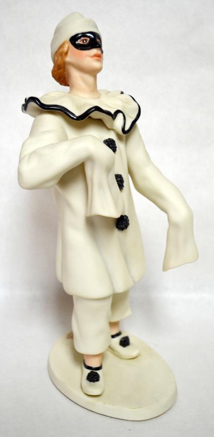CYBIS, BISQUE PORCELAIN, FIGURINE, 1985: CYBIS, BISQUE PORCELAIN, FIGURINE, 1985, H 12", "PAGLIACCI" Clown in Black and White with black accents. Bisque Porcelain Decorated. Signed Cybis. Design no: 5006. 12" H. x 3 1/2" W. x 4 1/2" D.