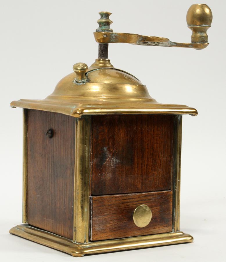 BRASS & MAHOGANY COFFEE GRINDER, H 10", W 6": BRASS & MAHOGANY COFFEE GRINDER, H 10", W 6"A brass and mahogany spice grinder having a removable drawer.