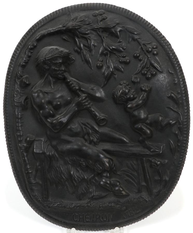 AFTER EDMUND BIRCH, WEDGWOOD BLACK BASALT PLAQUE: AFTER EDMUND BIRCH, WEDGWOOD BLACK BASALT PLAQUE, H 11.5", "CHEIRON 1782" A Wedgwood black basalt plaque titled "Cheiron 1782" after Edmund John Birch (English, 1797-1814). Depicting a satyr and danci