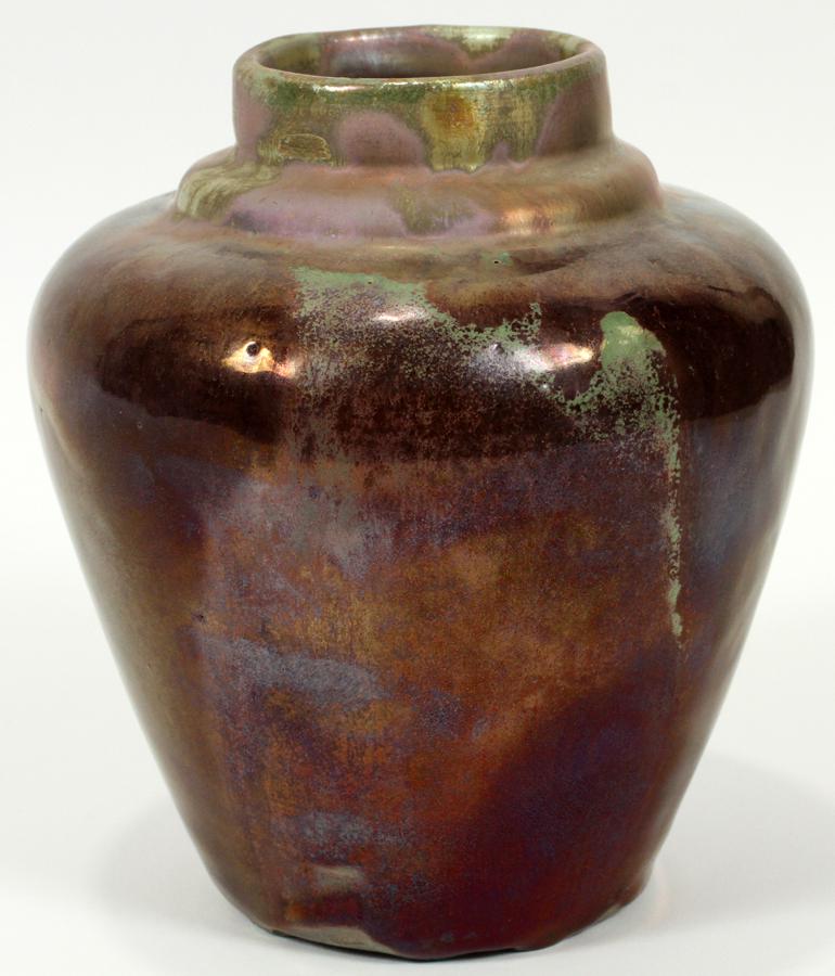 IRA & ELLA PETERS, POTTERY VASE, C. 1960-70: IRA & ELLA PETERS, POTTERY VASE, C. 1960-70, H 6", DIA 5.5"A Pewabic Pottery vase by Ira and Ella Peters. Having a white clay body and iridescent glaze boasting purple and sea foam green tones with ob