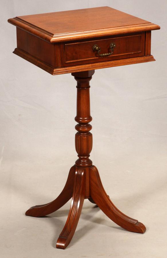 WALNUT PEDESTAL SIDE TABLE , H 30", W 14", L 16": WALNUT PEDESTAL SIDE TABLE , H 30", W 14", L 16" The side table has one drawer and rests on a four-footed pedestal base. Duncan Phyfe style. Circa 1940.
