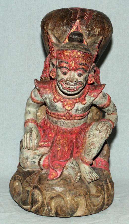 ANTIQUE HAND CARVED WOODEN, THAI DEMON: ANTIQUE HAND CARVED WOODEN, THAI DEMON, H 15", W 6", L 8" Antique, polychromed and hand carved, wooden Thai demon, H 15", W 6", L 8"