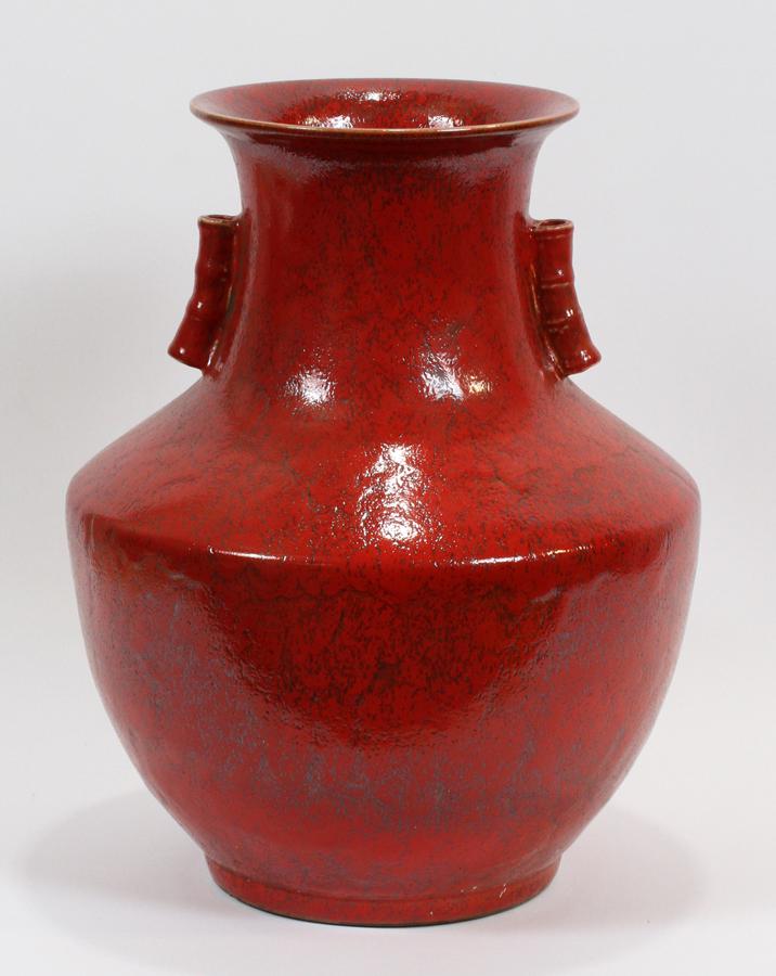 CHINESE DOUBLE HANDLE PORCELAIN URN: CHINESE DOUBLE HANDLE PORCELAIN URN, H 17", DIA 14" Crackeleur glaze. Deep cinnabar color. Bamboo form handles.