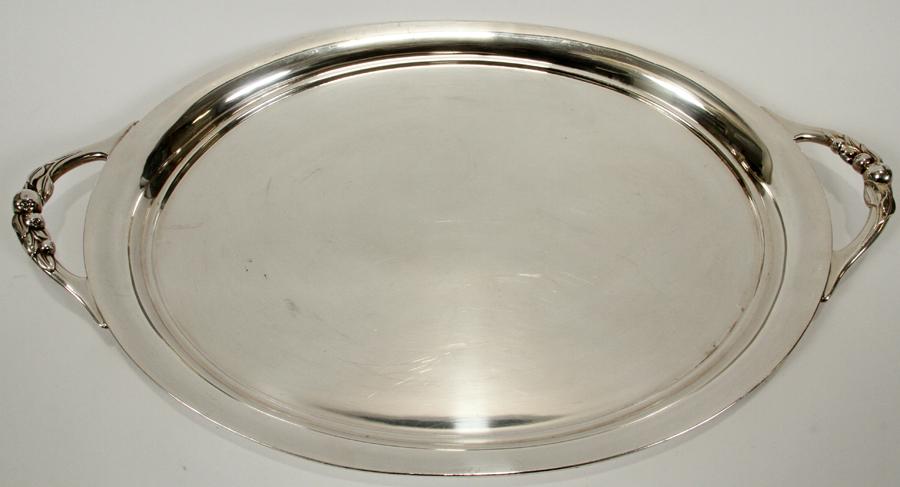 WEBSTER WILCOX 'APPLE' SILVER PLATE TRAY: WEBSTER WILCOX 'APPLE' SILVER PLATE TRAY, W 25", D 15"A Webster Wilcox silver plate tray. Having the 'Apple' pattern, form handles. Signature branding to the underside.